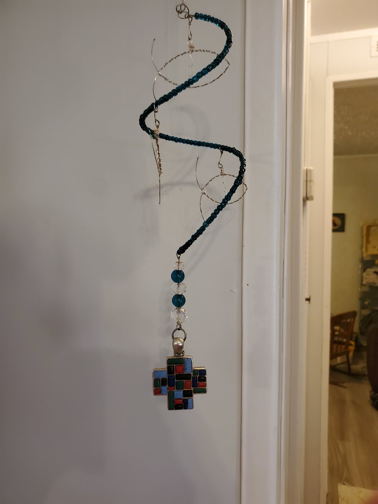 11" Indoor Hanging Fish Spinner hung by a 7" silver chain