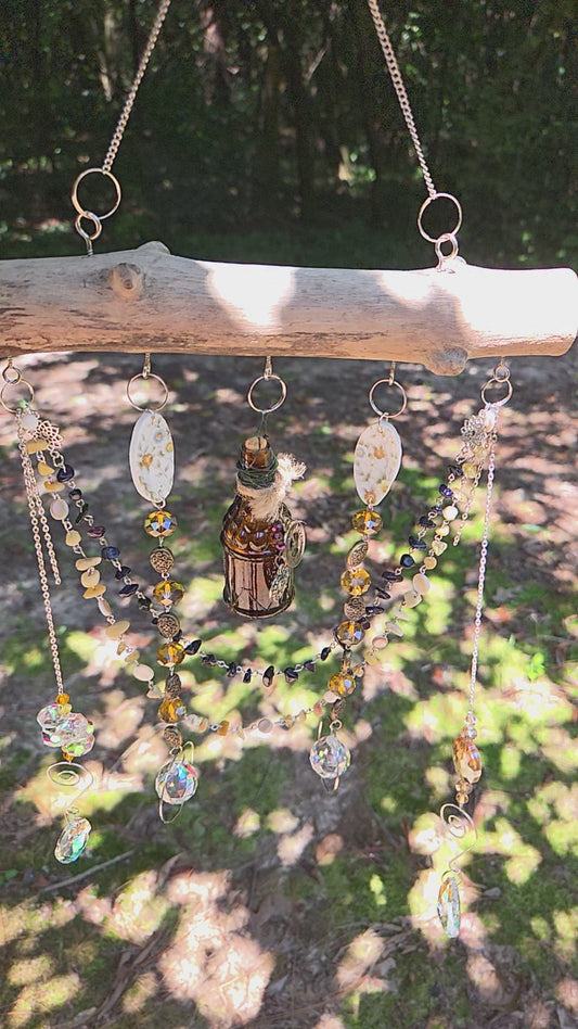 Amber bottle suncatcher