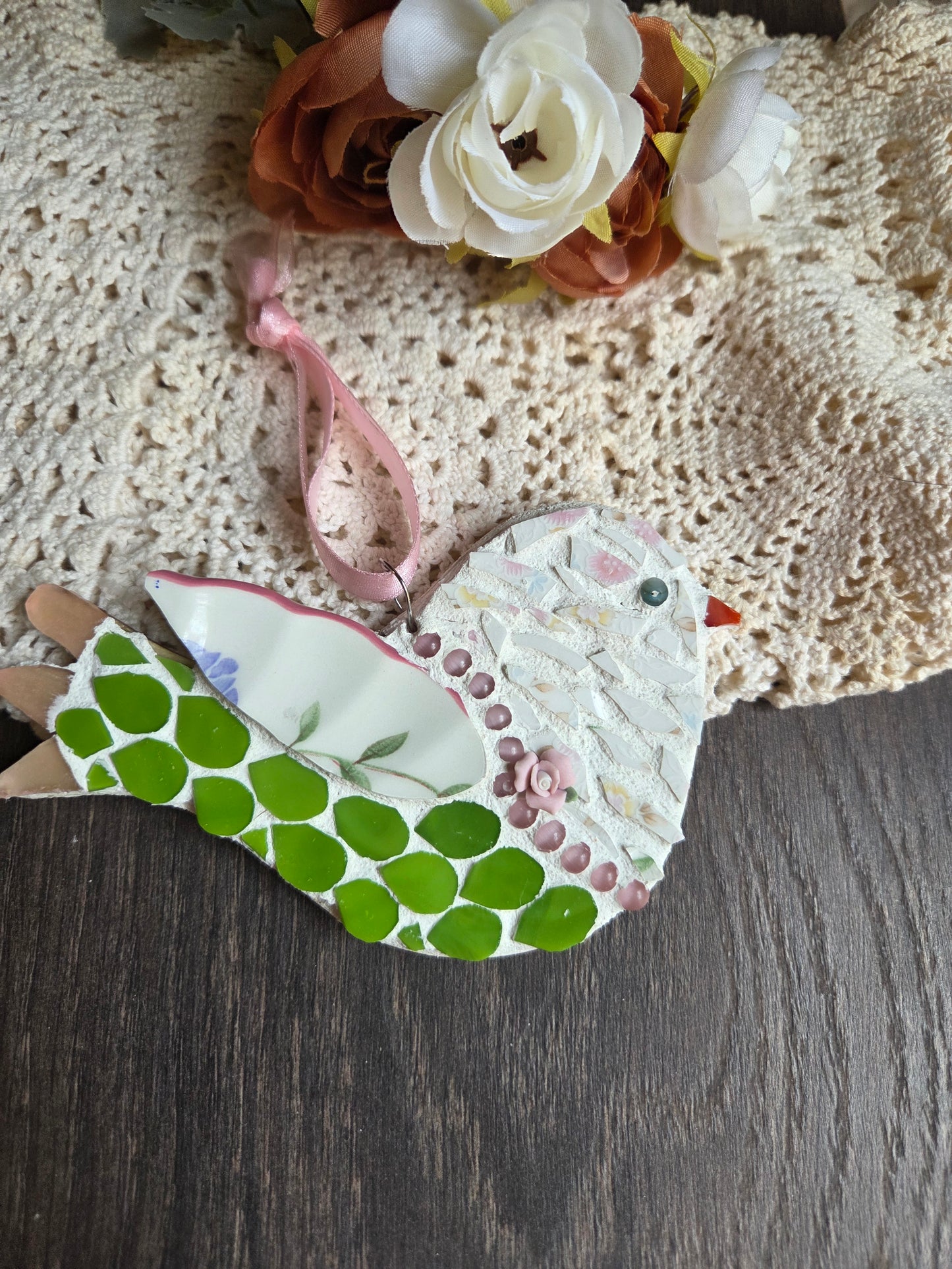 Little pink and green bird