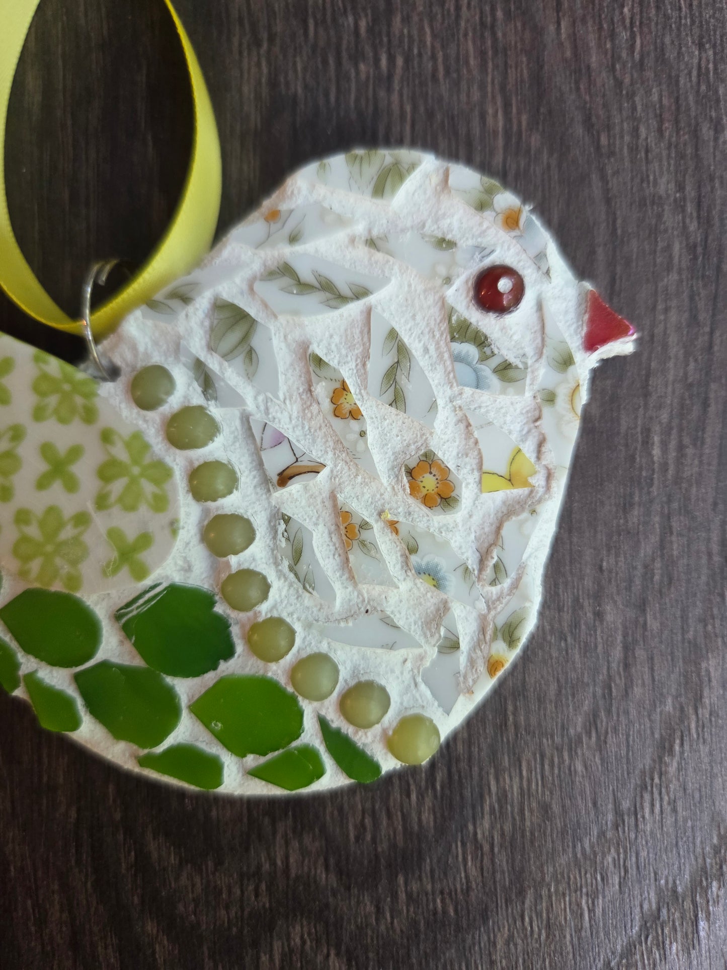 Little green and yellow bird