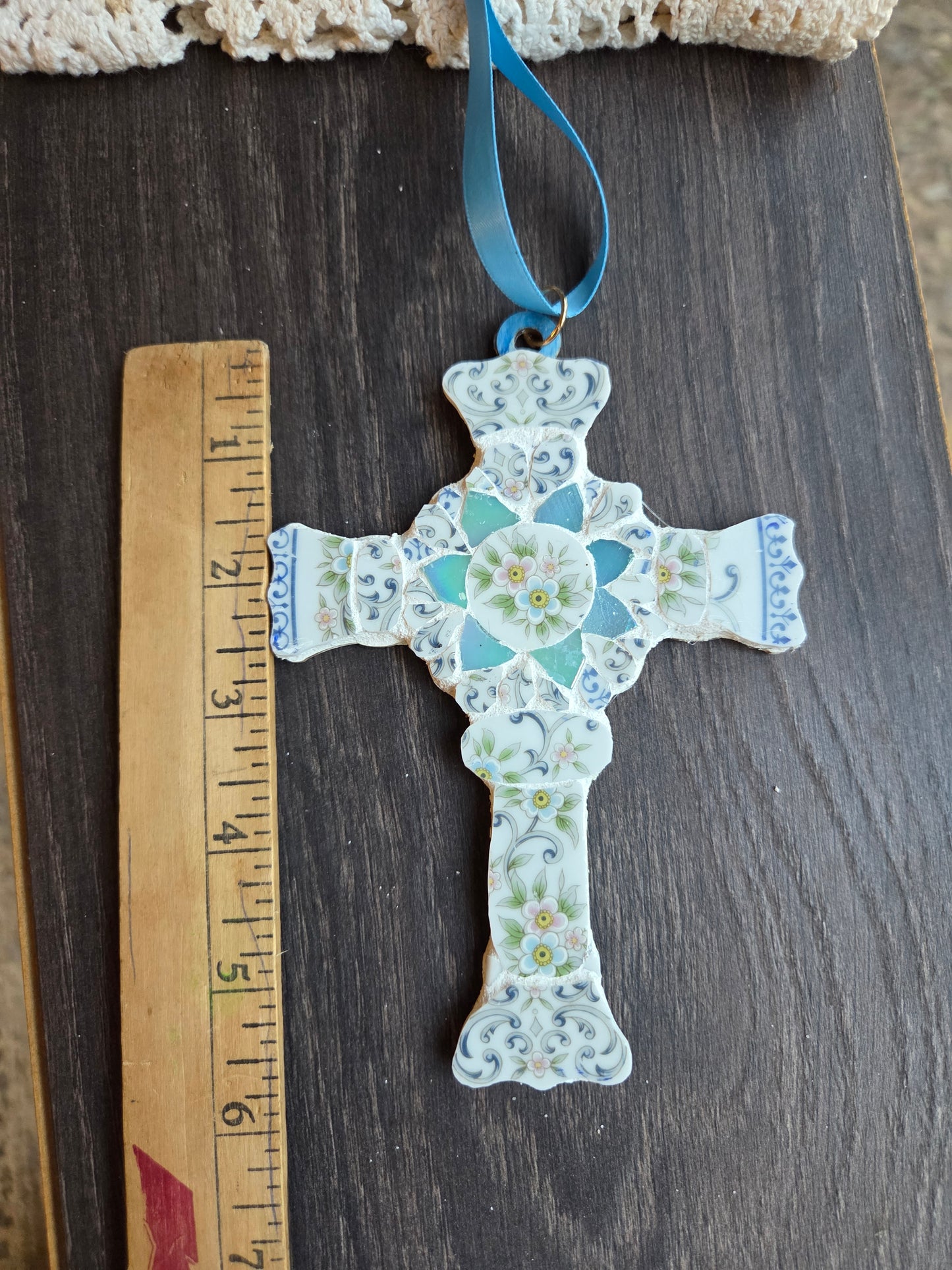 Blue scalloped edge broken china cross