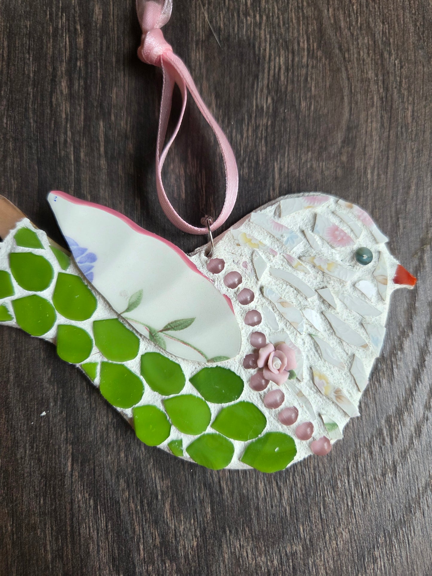 Little pink and green bird