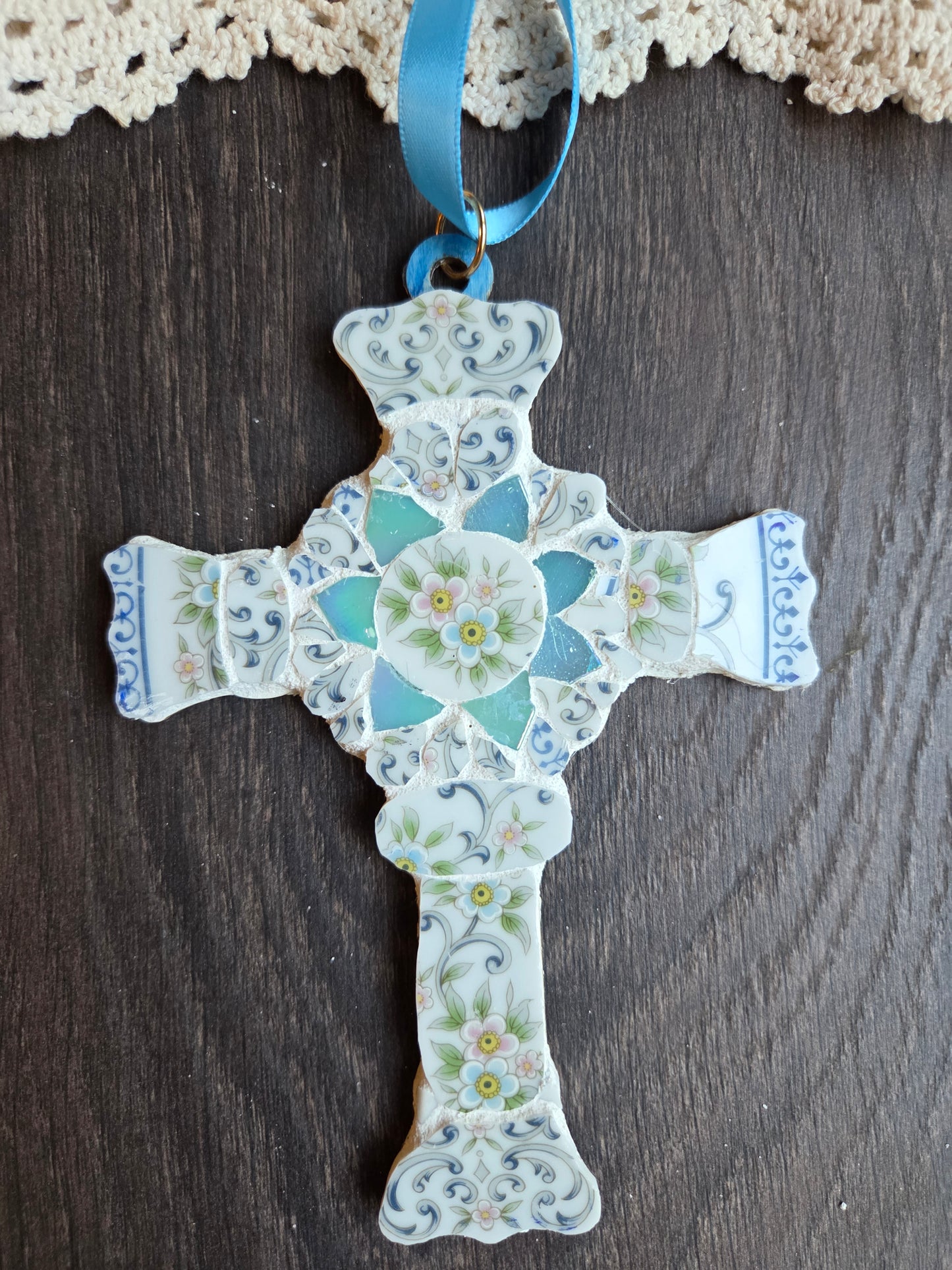 Blue scalloped edge broken china cross